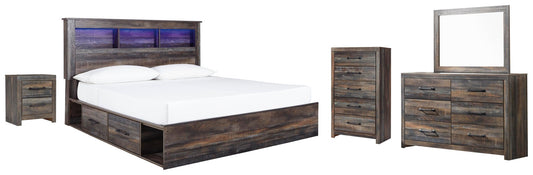 Cama Drystan King con librero, dos cajones, tocador con espejo, cómoda y mesita de noche.