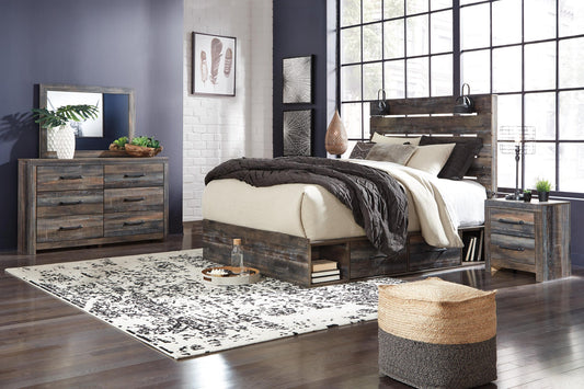 Cama Drystan tamaño King con dos cajones, tocador con espejo y mesita de noche.