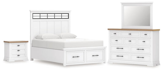 Cama Ashbryn Queen con cabecero, tocador con espejo y mesita de noche.