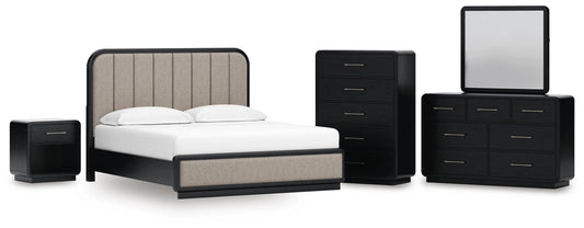 Cama Rowanbeck King tapizada con cabecero, tocador con espejo, cómoda y mesita de noche