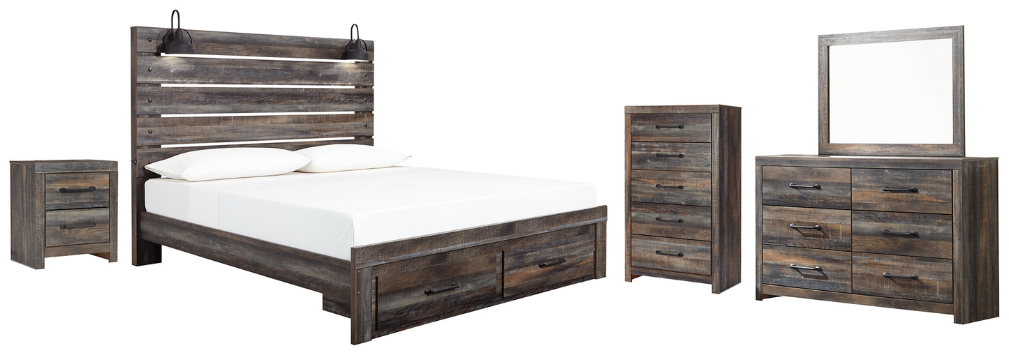 Cama Drystan tamaño King con cabecero y almacenaje, tocador con espejo, cómoda y mesita de noche.