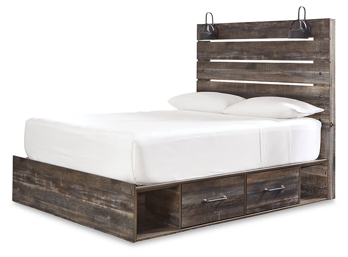 Cama Drystan tamaño Queen con cuatro cajones, tocador con espejo, cómoda y mesita de noche.
