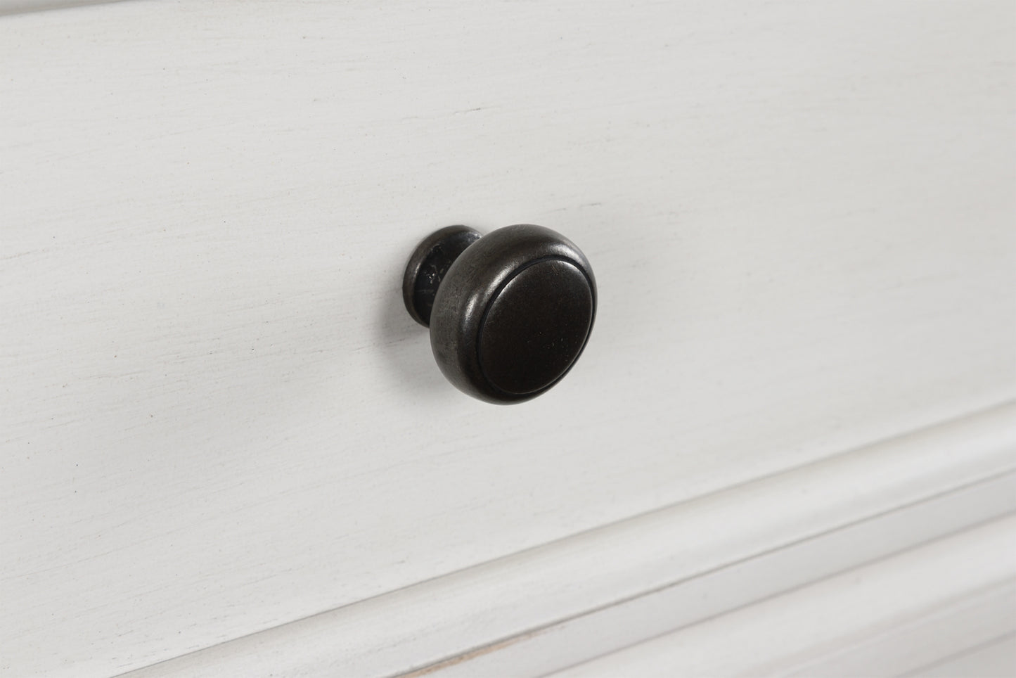 Cómoda Rowlenstown de cinco cajones