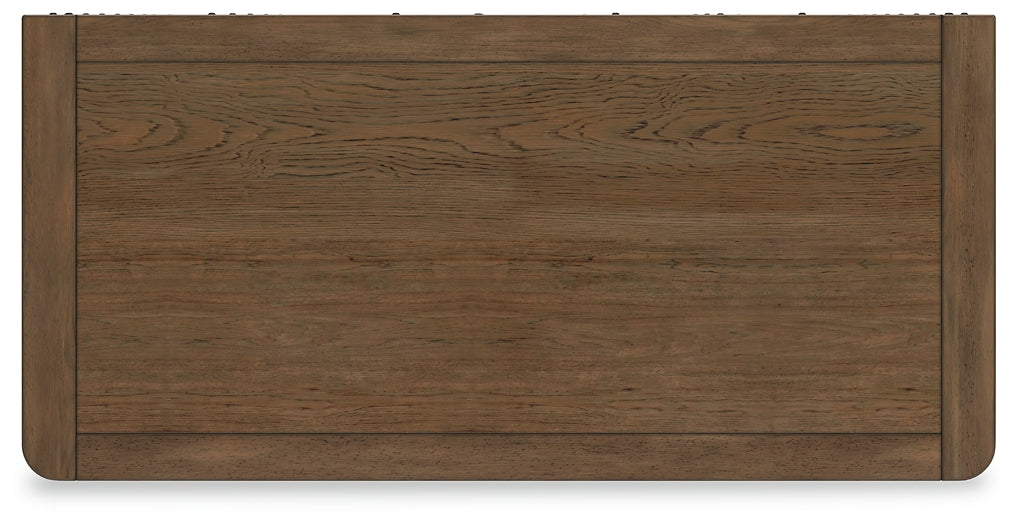 Cama Caballynn tamaño King con cabecero y almacenaje, tocador con espejo, cómoda y mesita de noche.