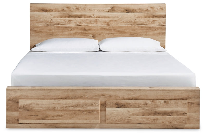 Cama Hyanna Queen con cabecero, tocador con espejo, cómoda y mesita de noche.