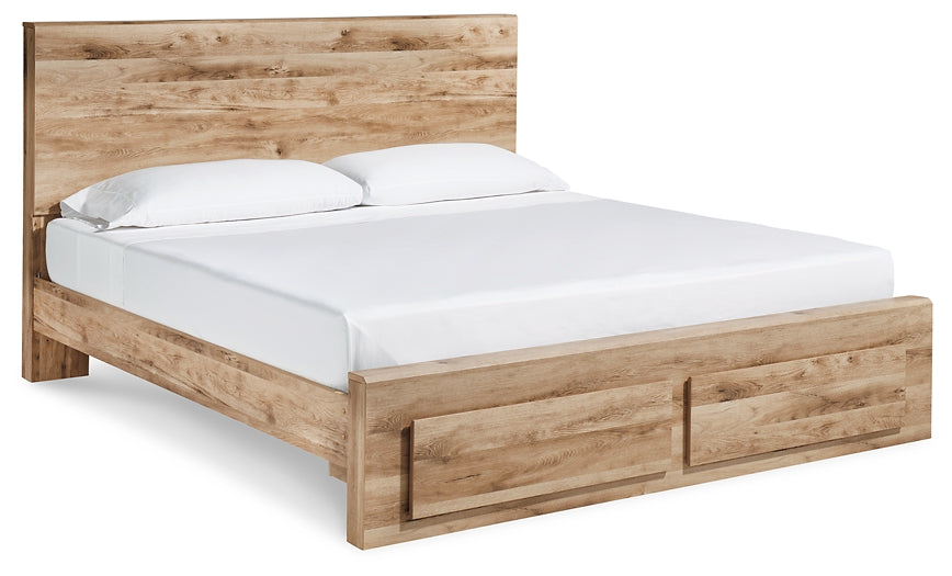 Cama Hyanna Queen con cabecero, tocador con espejo, cómoda y mesita de noche.