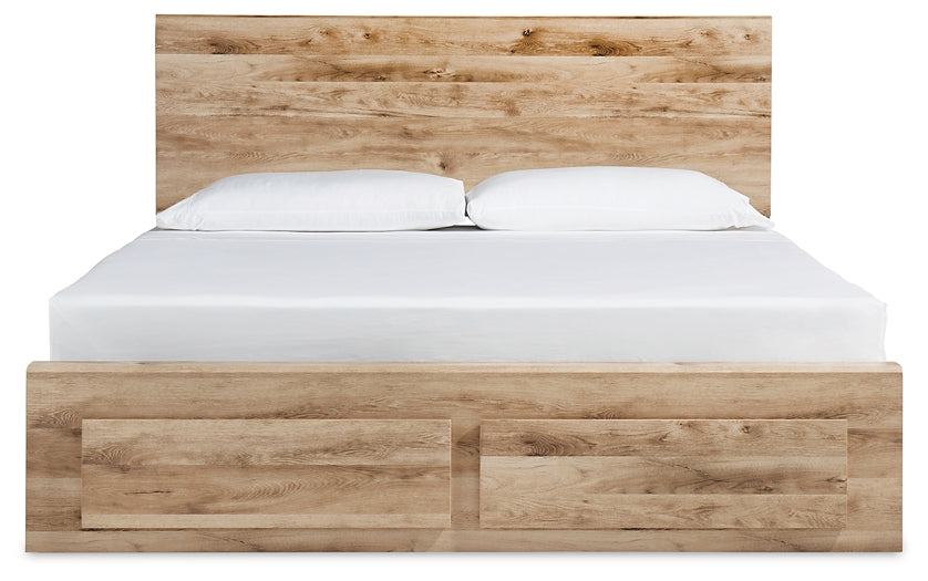 Cama Hyanna Queen con cabecero, tocador con espejo, cómoda y mesita de noche.