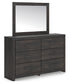Hollivern Queen Panel Bed with Mirrored Dresser, Chest and Nightstand