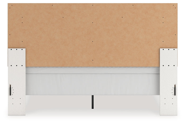 Cama tapizada Zuraleus King con panel