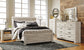Cómoda Bellaby de siete cajones