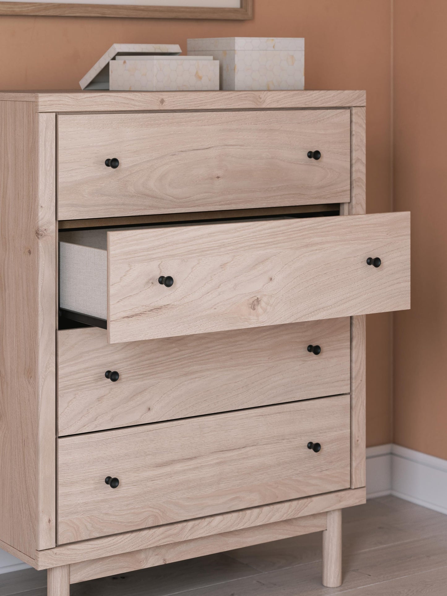 Cómoda Arloster de cuatro cajones