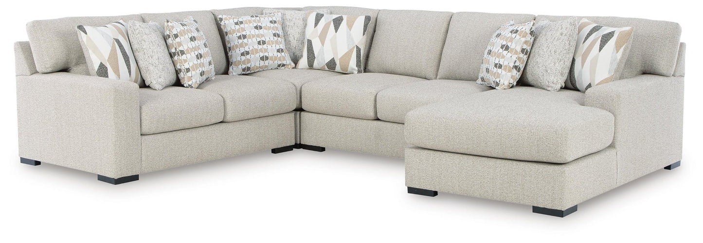 Sofá seccional Laurelgrove de 4 piezas con chaise longue
