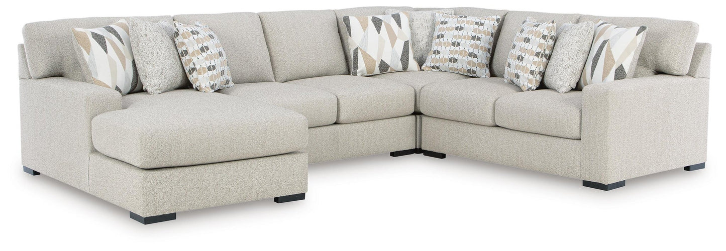 Sofá seccional Laurelgrove de 4 piezas con chaise longue