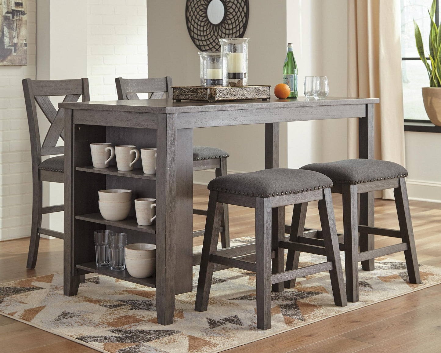 Mesa de comedor Caitbrook de altura de mostrador y 4 taburetes de bar