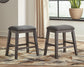 Mesa de comedor Caitbrook de altura de mostrador y 4 taburetes de bar
