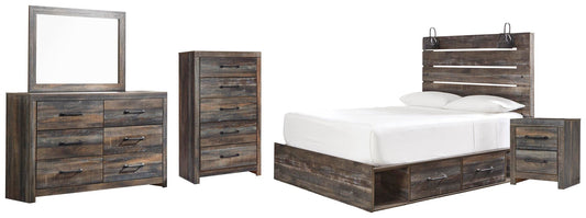 Cama Drystan tamaño Queen con cuatro cajones, tocador con espejo, cómoda y mesita de noche.