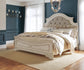 Cama tapizada Realyn Queen con tocador con espejo