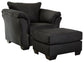 Sillón y otomana Darcy
