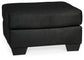 Sillón y otomana Darcy