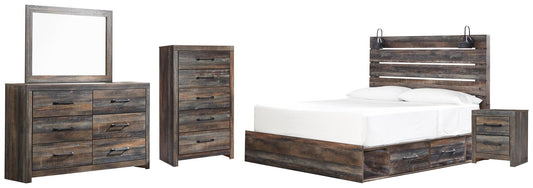 Cama Drystan tamaño King con dos cajones, tocador con espejo, cómoda y mesita de noche.