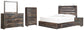 Cama Drystan tamaño King con dos cajones, tocador con espejo, cómoda y mesita de noche.