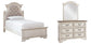 Cama doble con cabecero y tocador con espejo Realyn