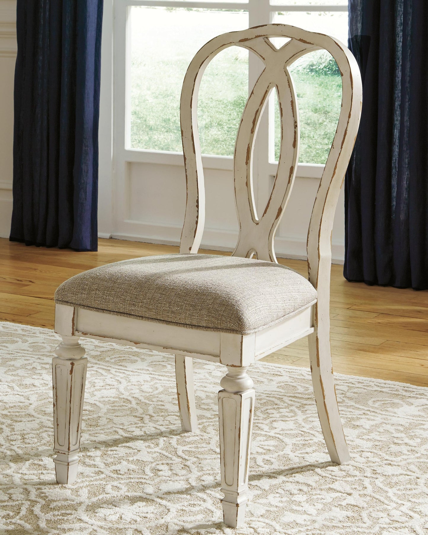 Mesa de comedor Realyn y 8 sillas