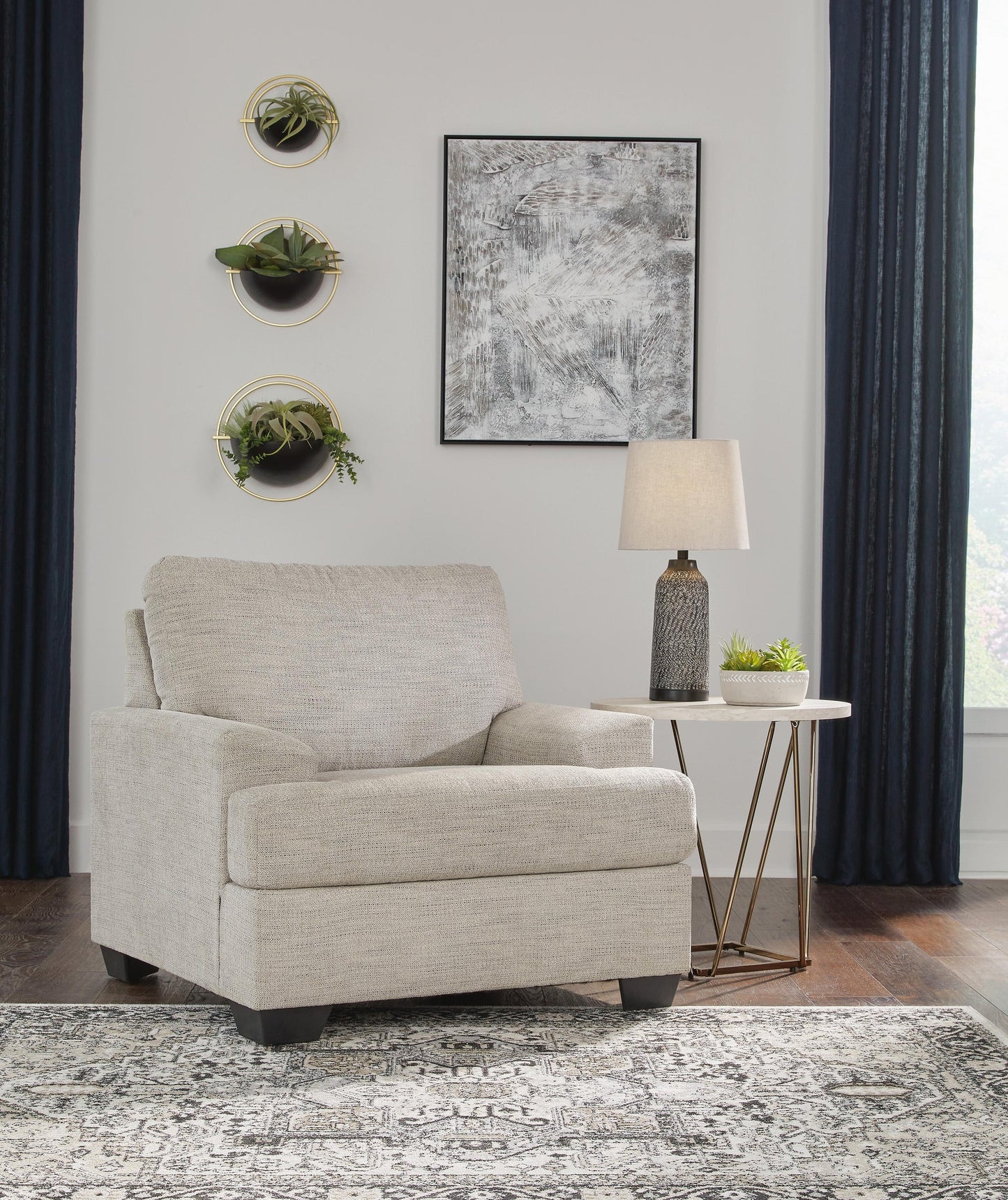 Sillón y otomana Vayda