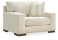 Sillón y otomana Maggie