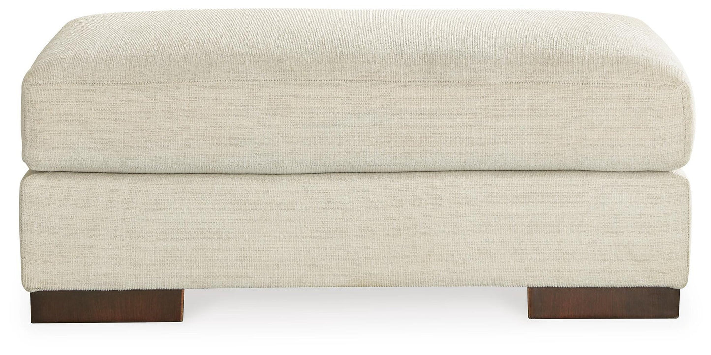 Sillón y otomana Maggie