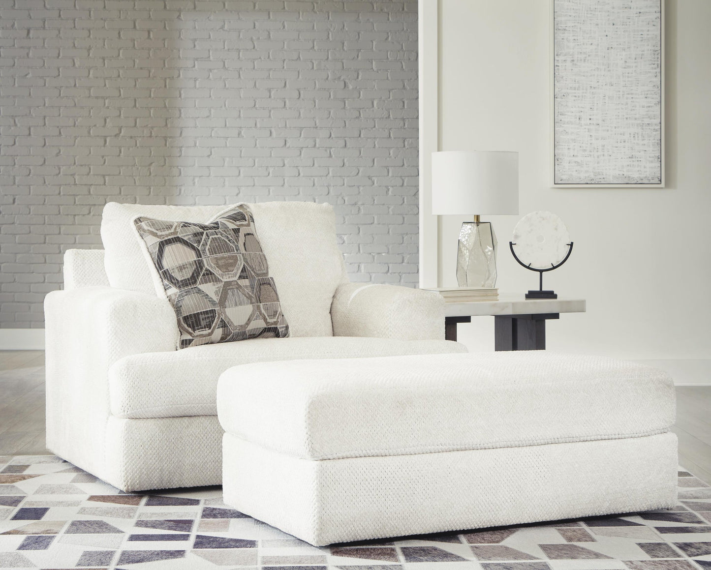 Sillón y otomana Karinne