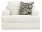 Sillón y otomana Karinne