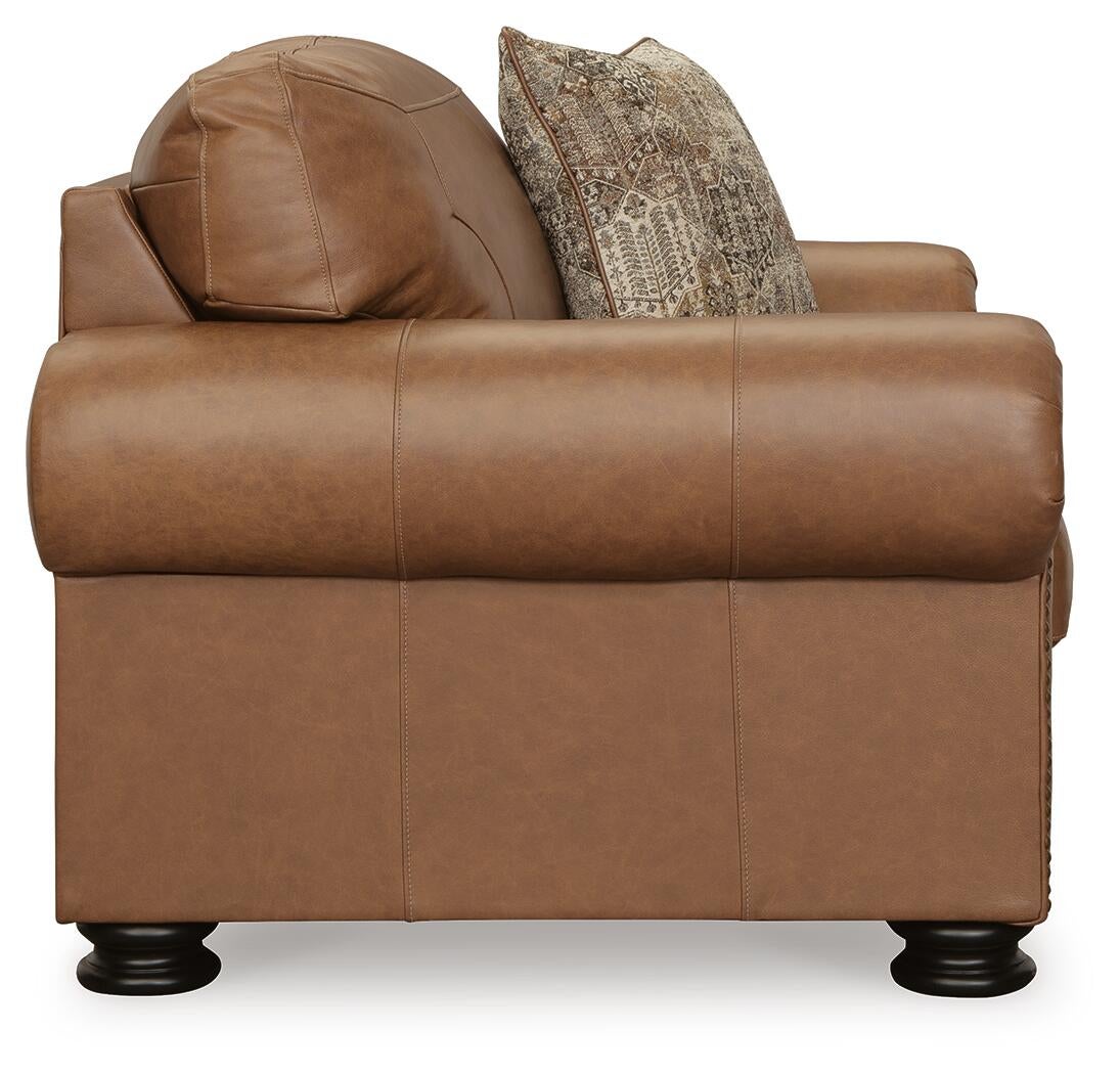 Sillón y otomana Carianna