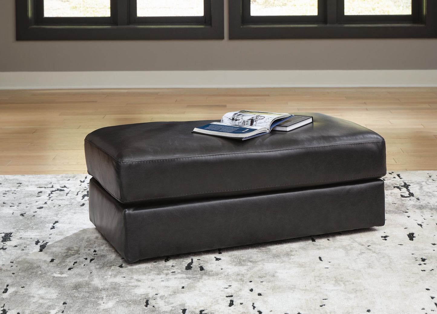 Sillón y otomana Amiata