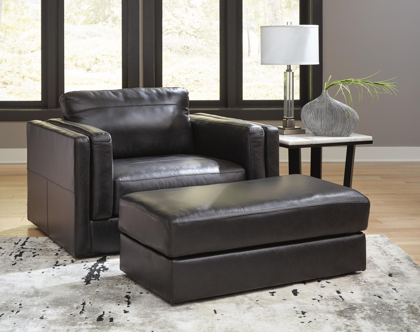 Sillón y otomana Amiata