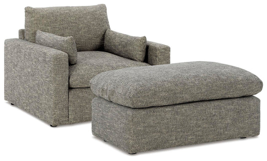 Sillón y otomana dramáticos