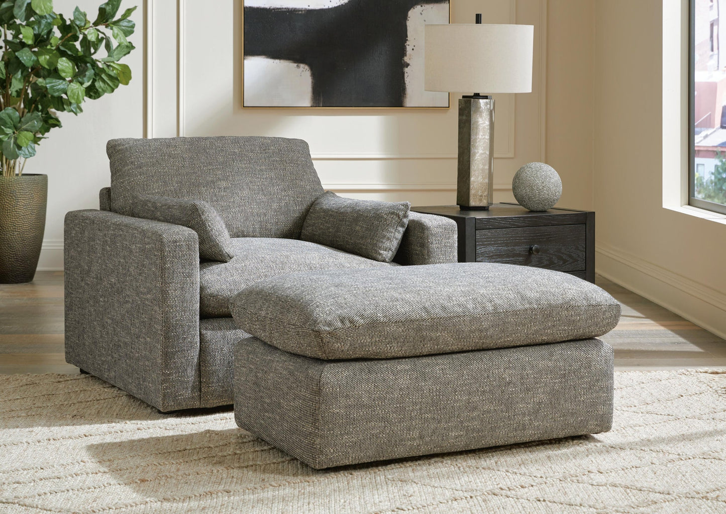 Sillón y otomana dramáticos