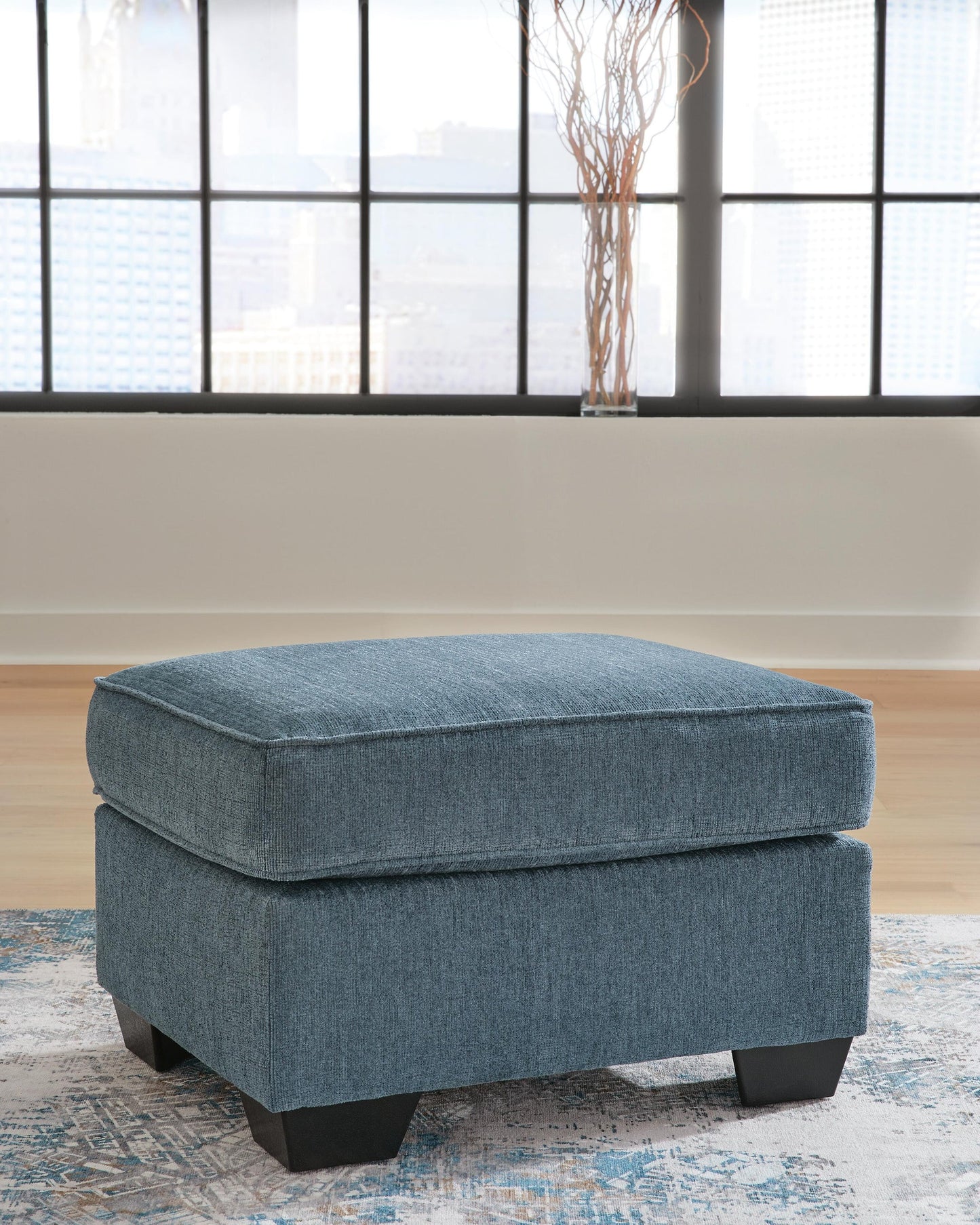 Sillón y otomana Cashton