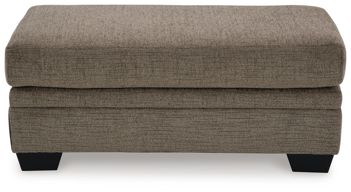 Sofá chaise longue, sillón y otomana Stonemeade