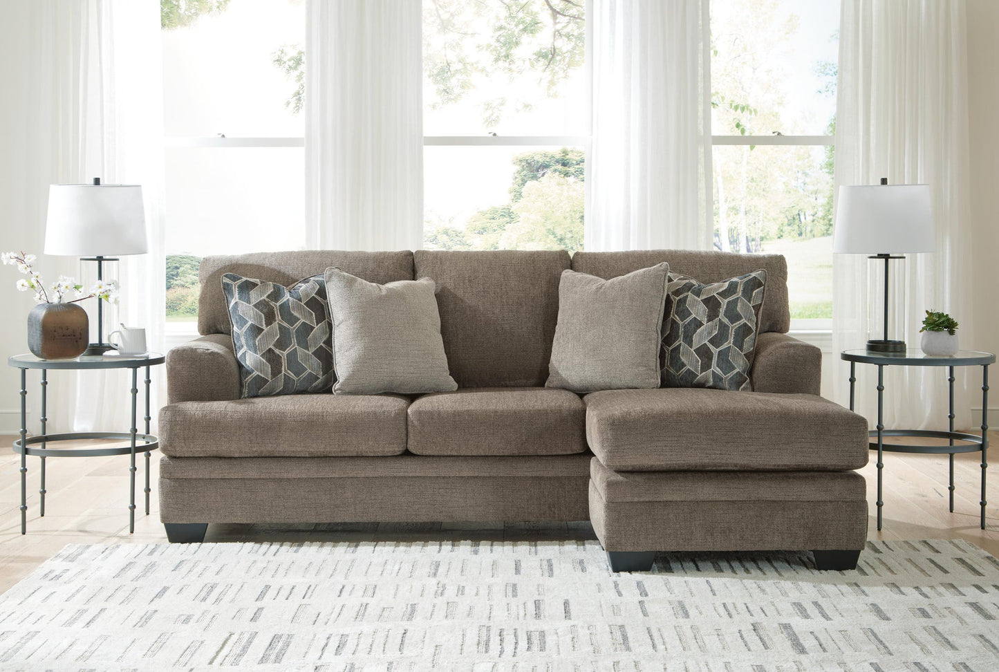 Sofá chaise longue, sillón y otomana Stonemeade