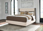 Anibecca King Upholstered Bed with Mirrored Dresser and Chest