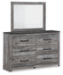 Bronyan King Panel Bed with Mirrored Dresser and Chest
